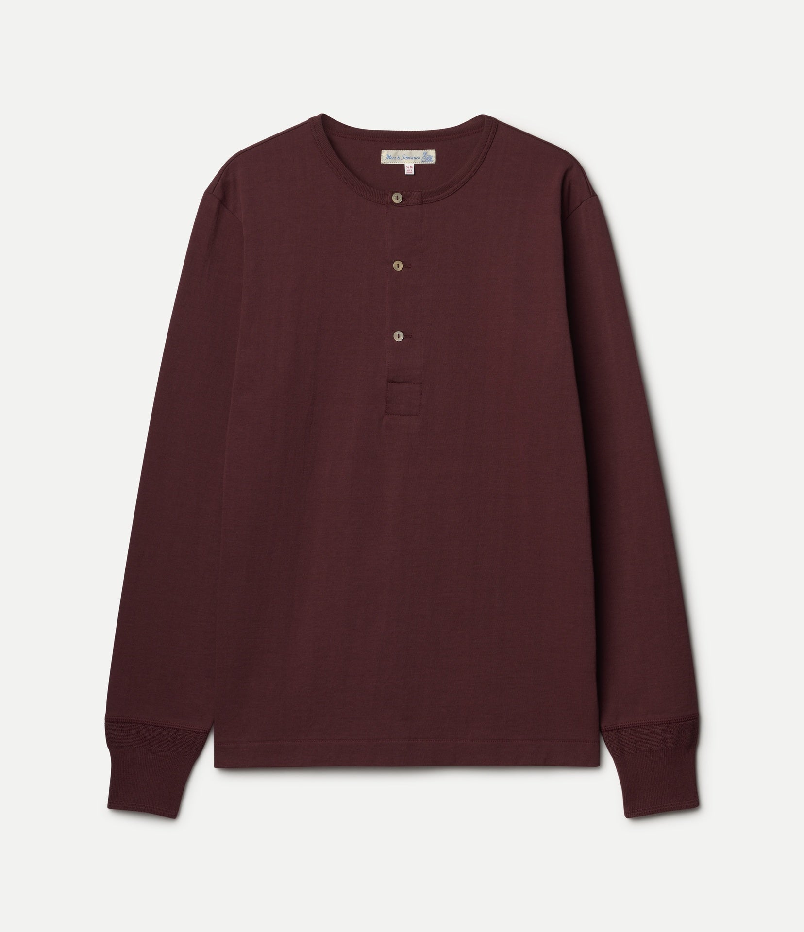 Burgundy long-sleeve henley shirt on a light gray background
