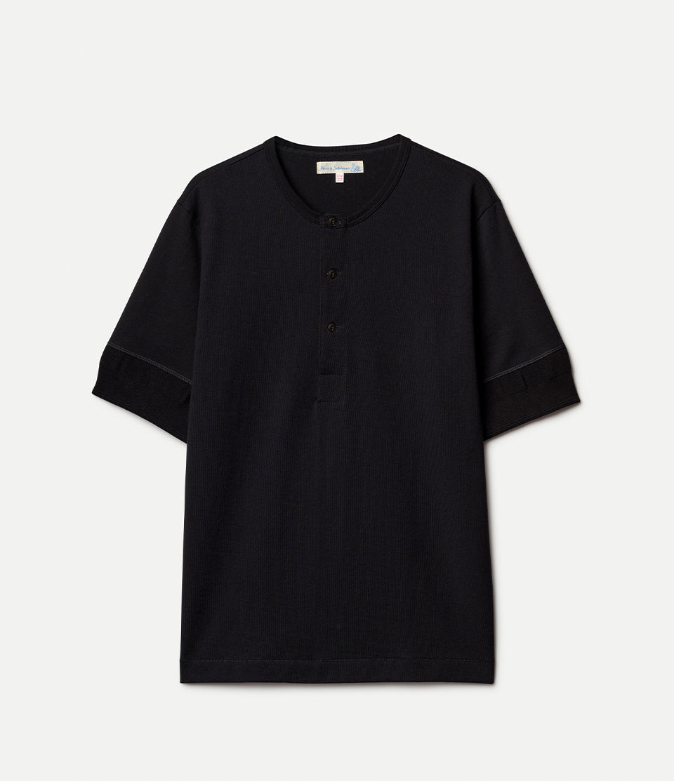 Black short-sleeve henley shirt with buttons on a white background