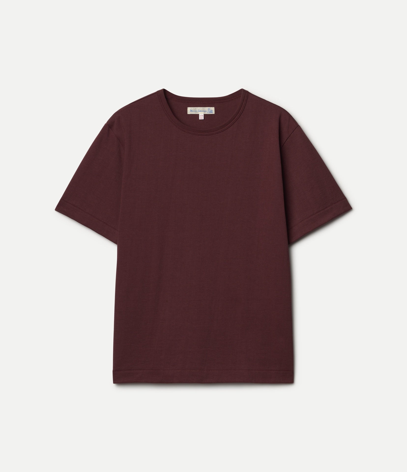 Burgundy cropped t-shirt on a light gray background