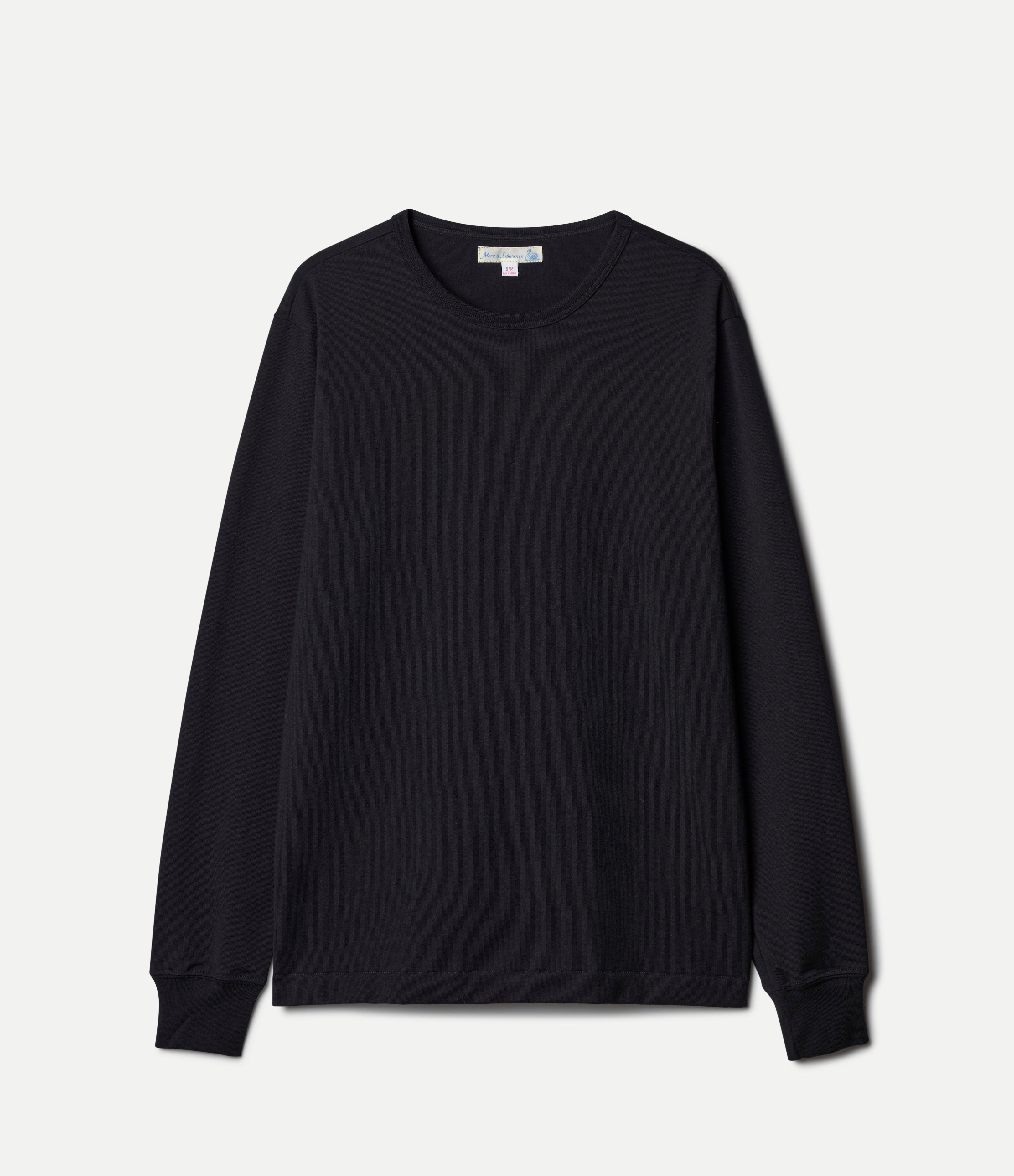 Black long-sleeve shirt on a light gray background
