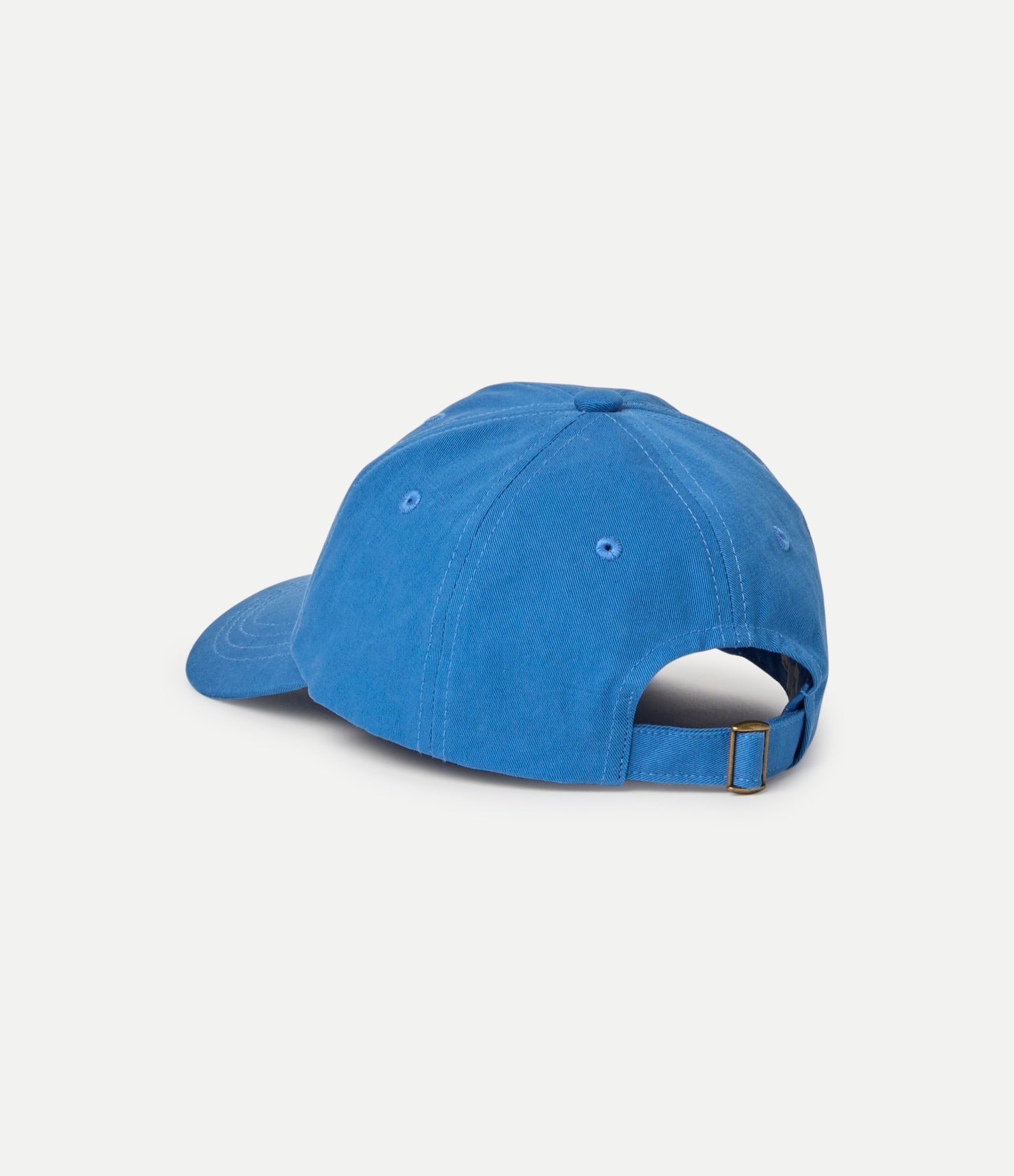 Blue baseball cap on a light gray background