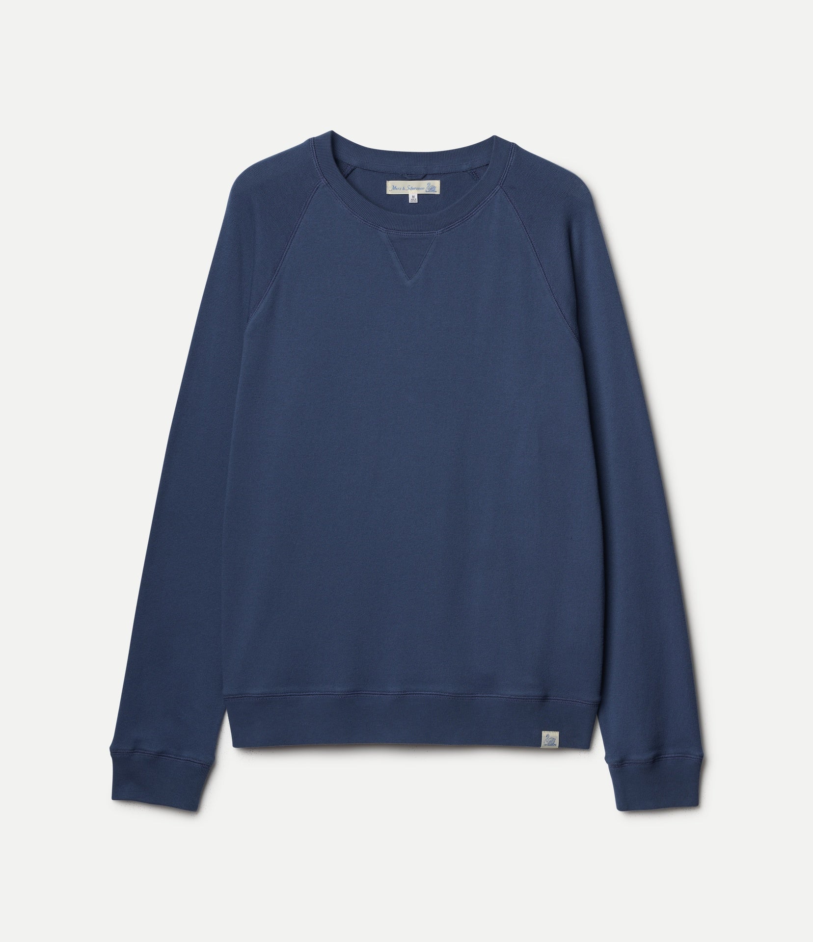 Indigo Blue sweatshirt on a light gray background
