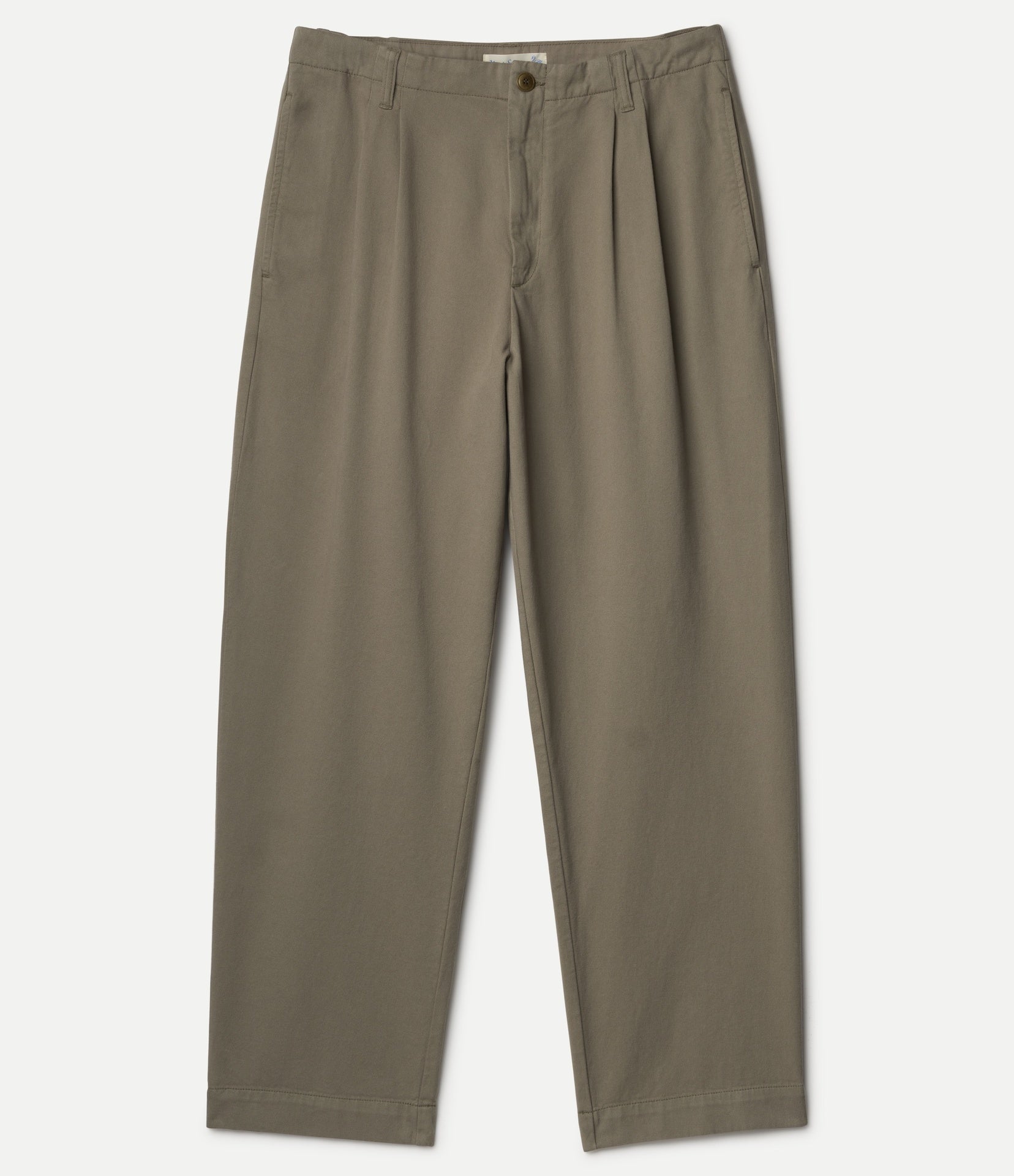 Green pleated pants on a white background
