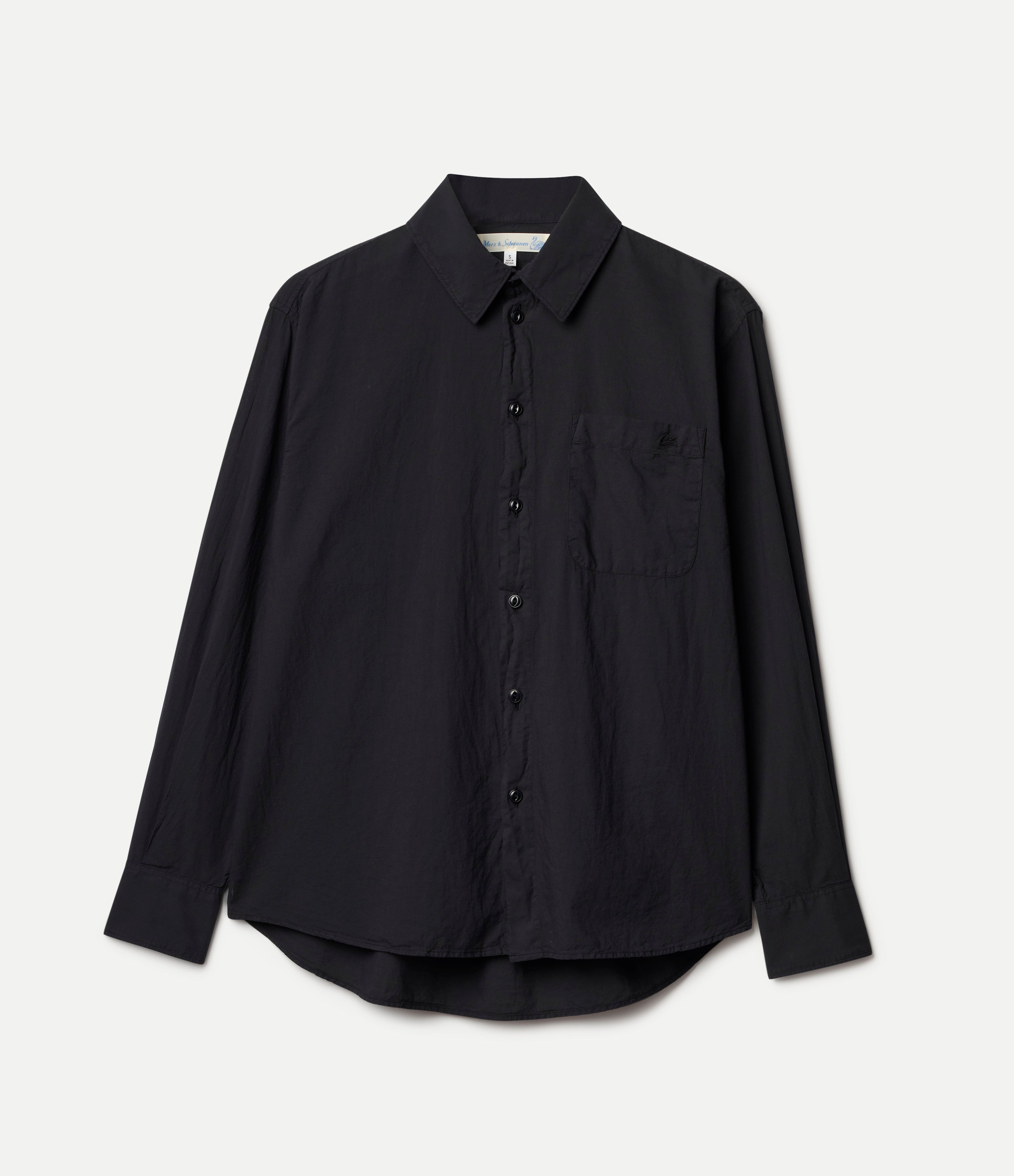 Black button-up shirt on a light gray background