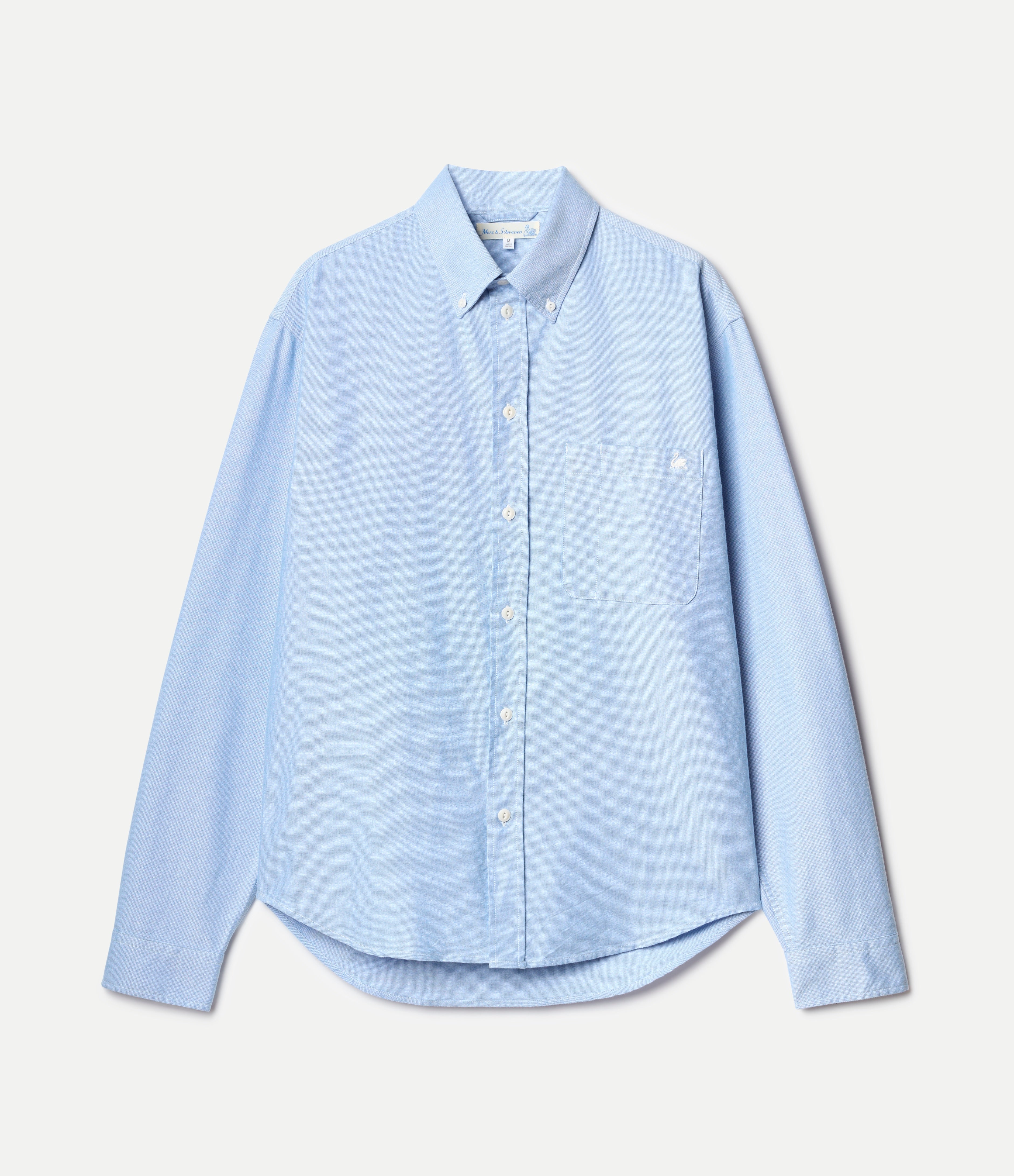 Light blue button-down oxford shirt on a white background