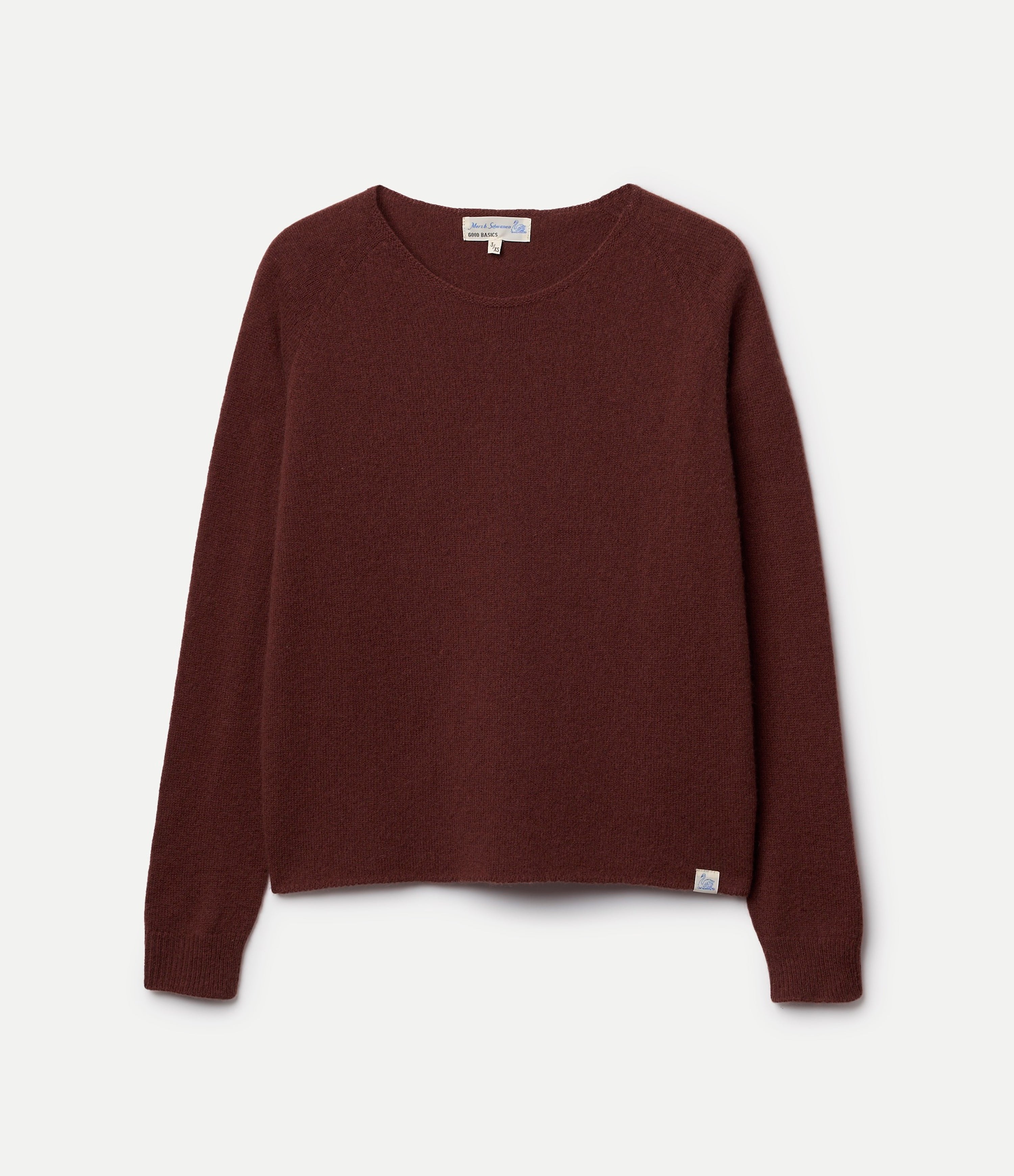 Brown sweater made of merino wool, silk and cashmere against neutral background