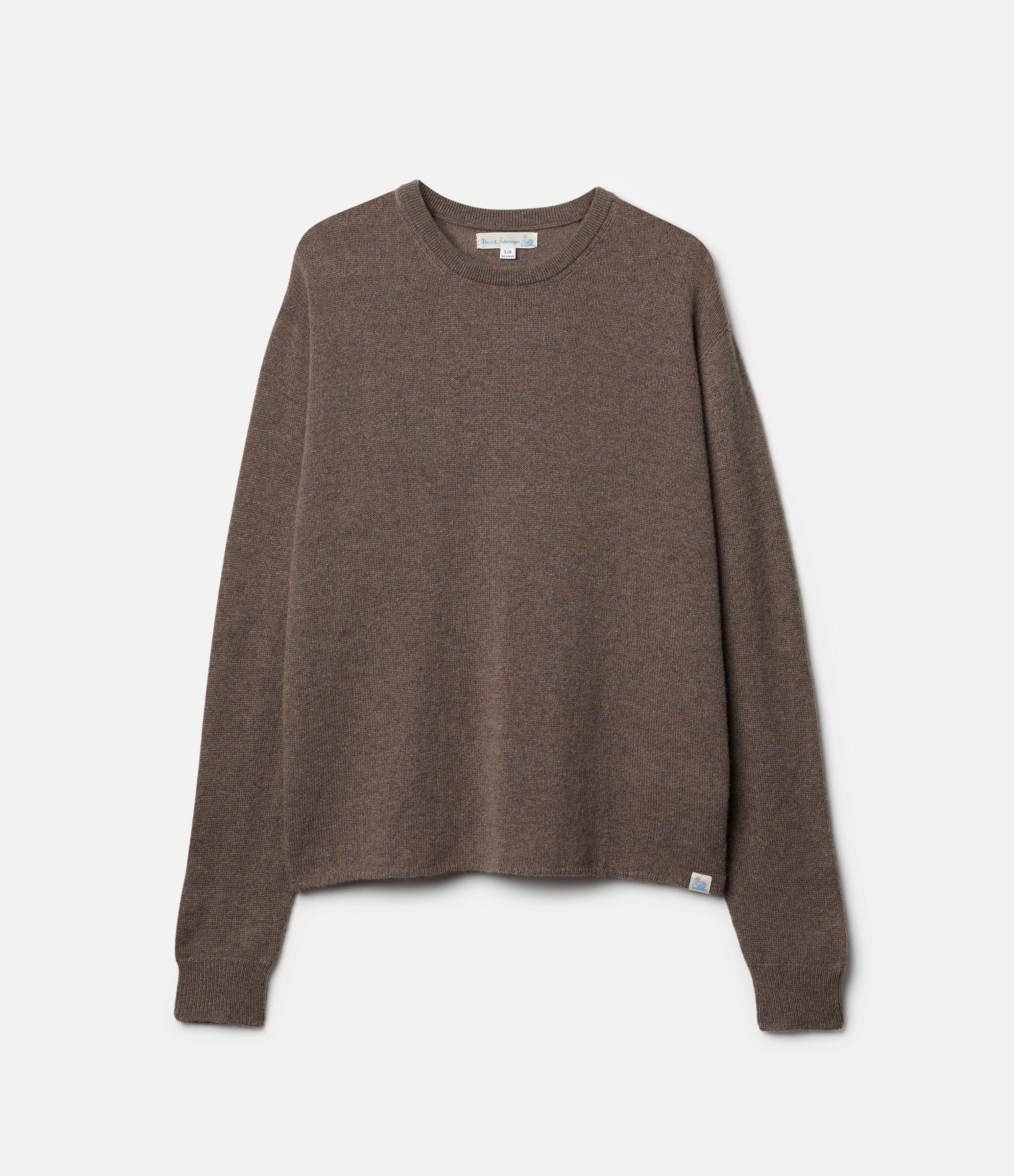 A grey, long-sleeved, extra-fine merino wool-cashmere-silk sweater against a white background.