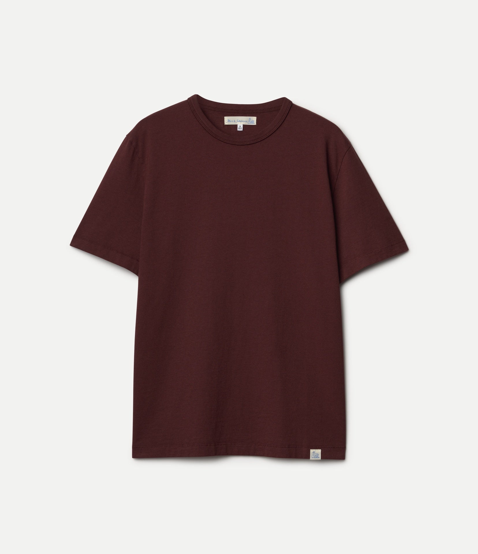 Maroon t-shirt on a light gray background