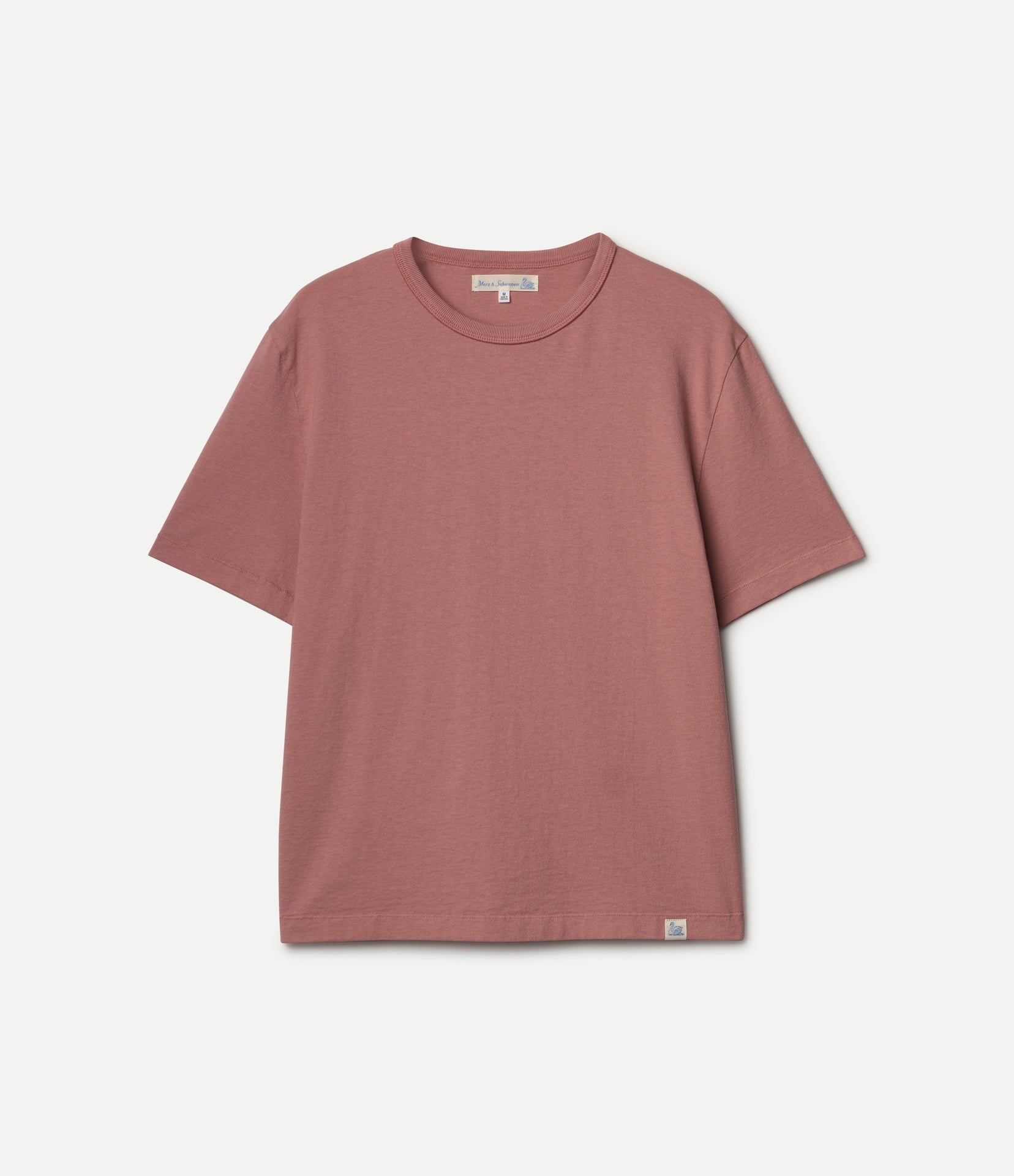 Mauve t-shirt on a light gray background