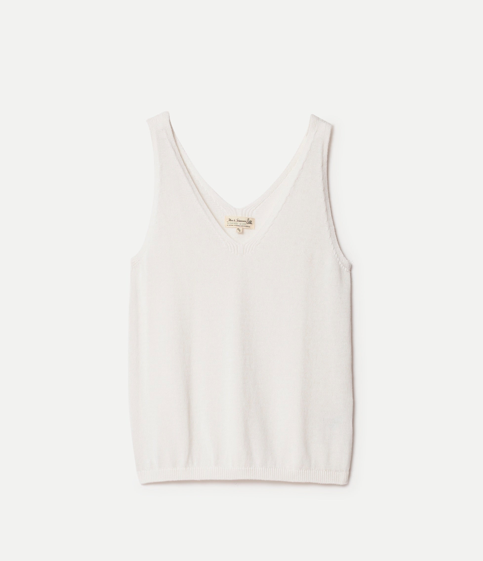 White knitted tank top on a light gray background