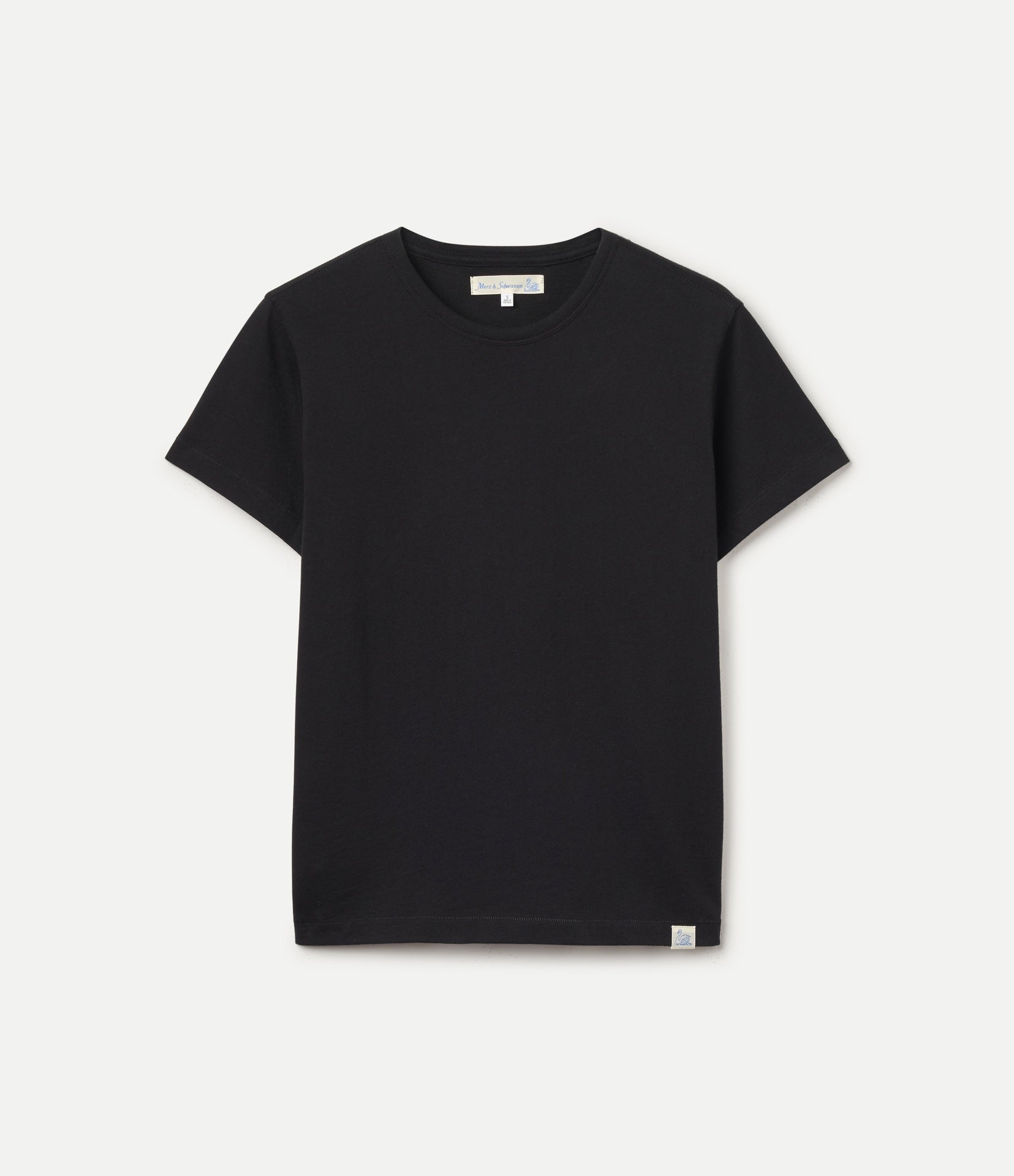 A black short-sleeve crewneck t-shirt with a small white tag on the bottom hem, displayed flat against a light gray background.